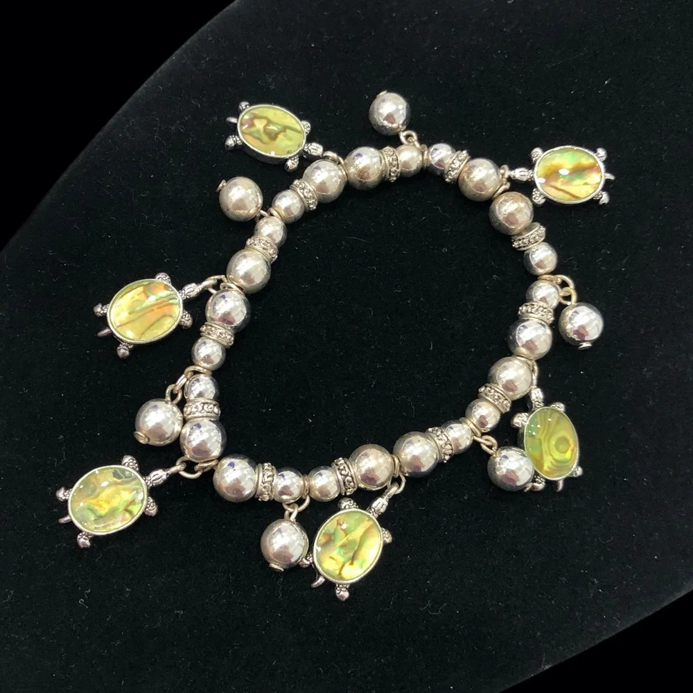 VINTAGE SILVER TONE BEADS & GREEN TURTLE CHARM STRETCH BRACELET